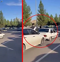 Diyarbakır'da yolda kalan aracı kaput üzerinden ittirdiler