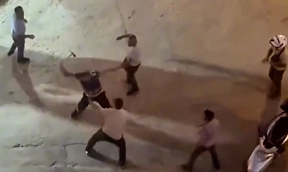 Kavga ettiği şahsa nacak ile saldırdı