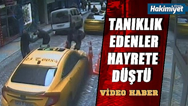 İkinci kattan taksinin üzerine düştü!