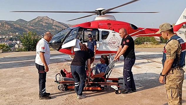 Ayağı kırılan kadın helikopterle hastaneye kaldırıldı