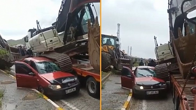 Elazığ'da Tırın Üstündeki İş Makinesi Aracın Üstüne Düştü