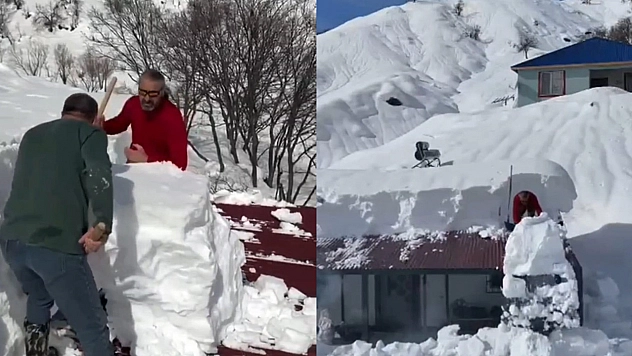 Yoğun yağış nedeniyle evler kara gömüldü,karlar kütleler halinde atıldı