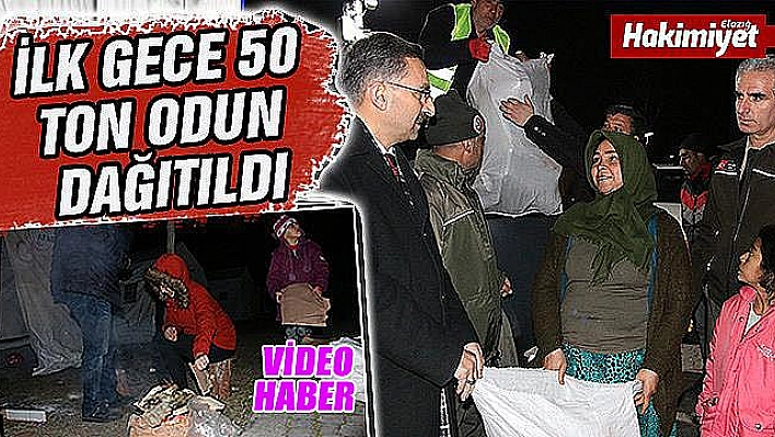 Depremzedelere 50 ton odun dağıtıldı