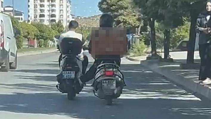 Benzini bitince motosikletini ayağıyla itti