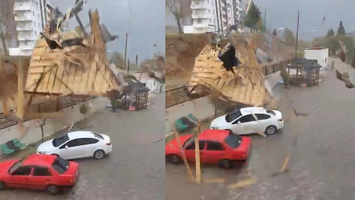 Elazığ'da fırtınada uçan çatının araçların yanına düşmesi kamerada
