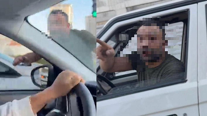 Trafikte tartıştığı kadınların otomobilini yumrukladı