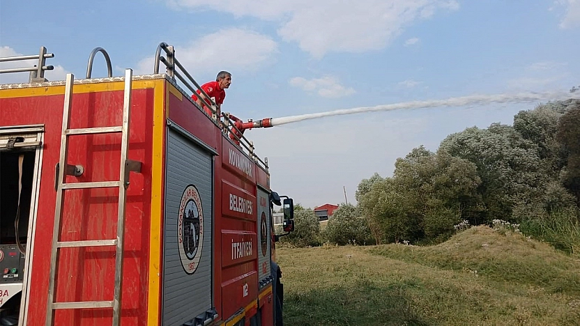 Ağaçlık alanda çıkan yangın itfaiye ekiplerince söndürüldü